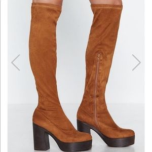 70s inspired thigh high platforms